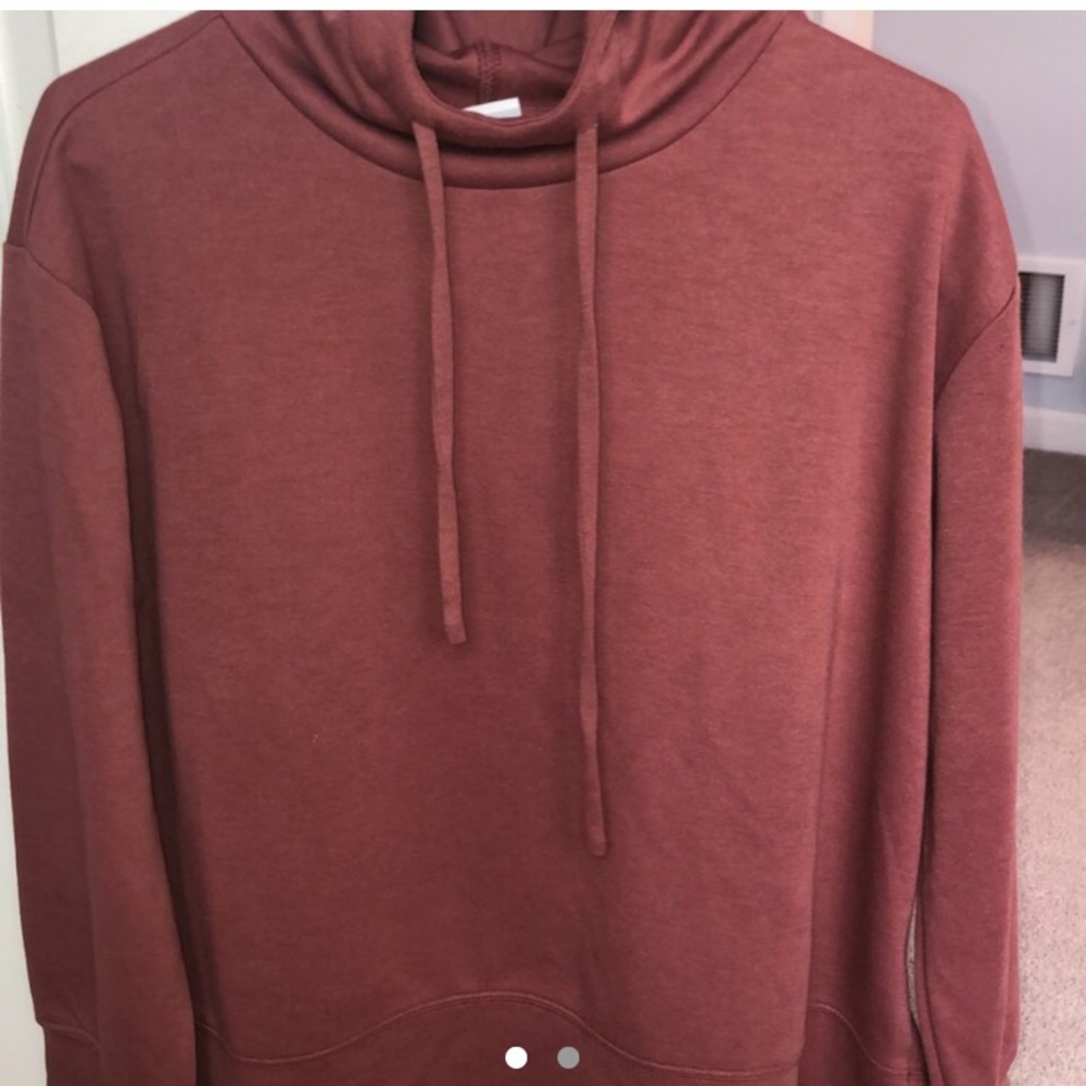 pinkish hooded shirt